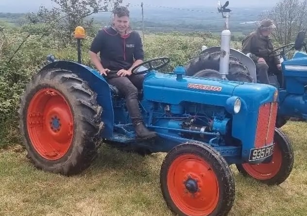 Brian Davis's restored Fordson tractor with grandson Aidan.