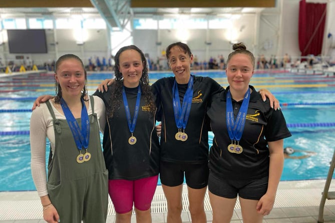 Tavistock Swimming Club team, Hannah Walker, Izzy Teague, Sam Lake and Hannah Walker with their medals at the Devon Masters Championships in Plymouth.