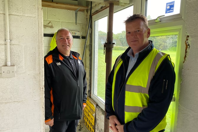 Horrabridge Rangers FC chair Ian Mulholland and contractorJonathan Case inside the old pavilion