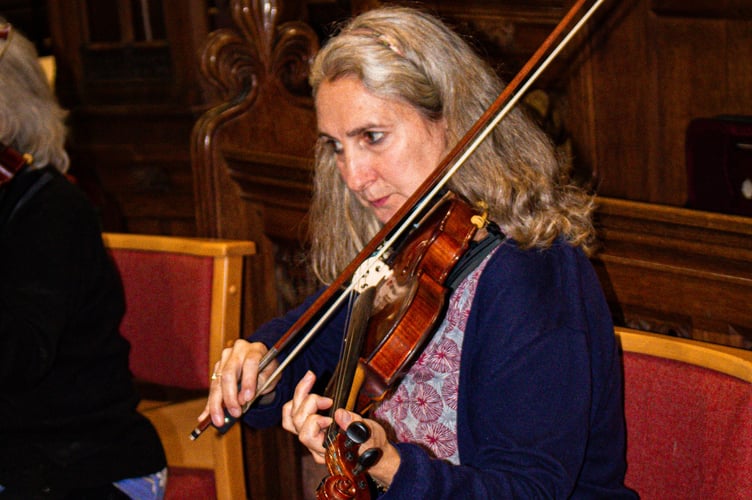 One of the musicians performing in the church at part of the open day