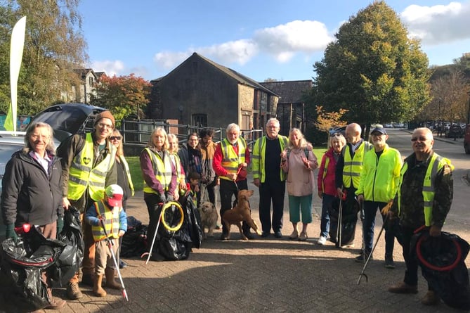 Members of Tidy Tavi marking 13 years of keeping Tavistock tidy 