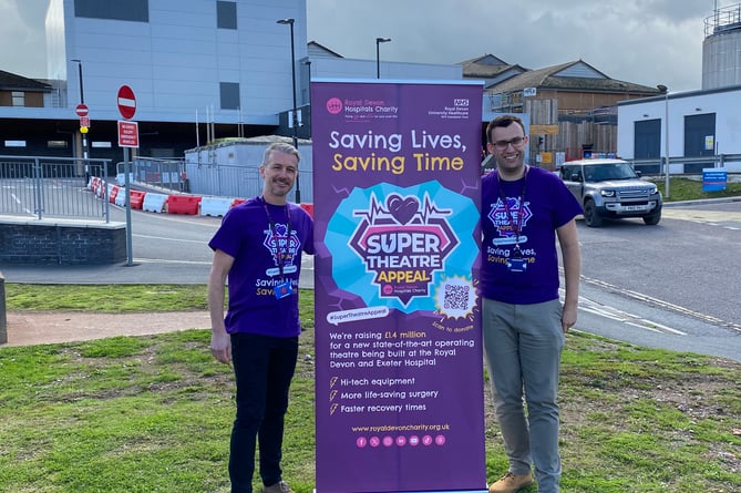 Andy Keeble and Tom Darby Clark from the Royal Devon Hospitals Charity in front of the site for the new 'super theatre' at the hospital