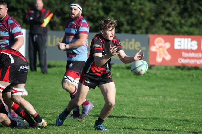 Scrumhalf Freddie Fuller gets the ball away