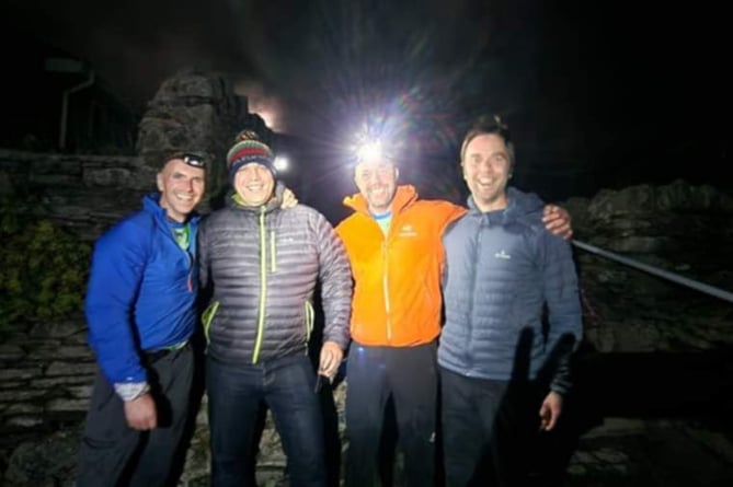 The end of the charity trek at Wembury Beach by Nige Locke, Steve Payne, Steve Andrews and Lee Wickett.