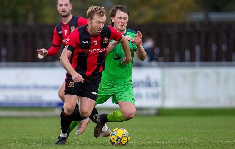 Liam Prynn in action against Willand Rovers