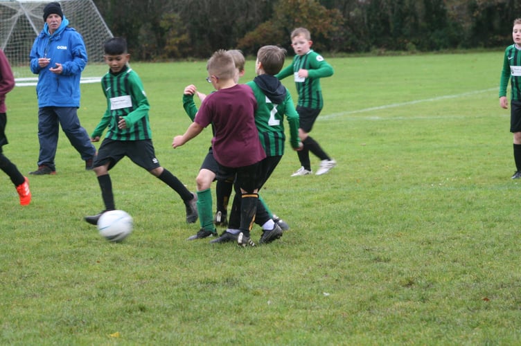 Tavistock schools football hard tackling.