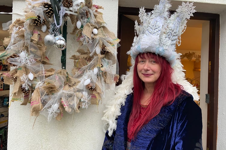 Artist and festive snow queen Christine Smith made Christmas wreaths to brighten up Tavistock's Paddons Row