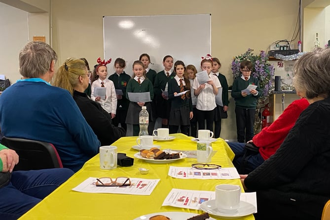 Tavistock Stroke Club enjoy Christmas carols by St Peter's School