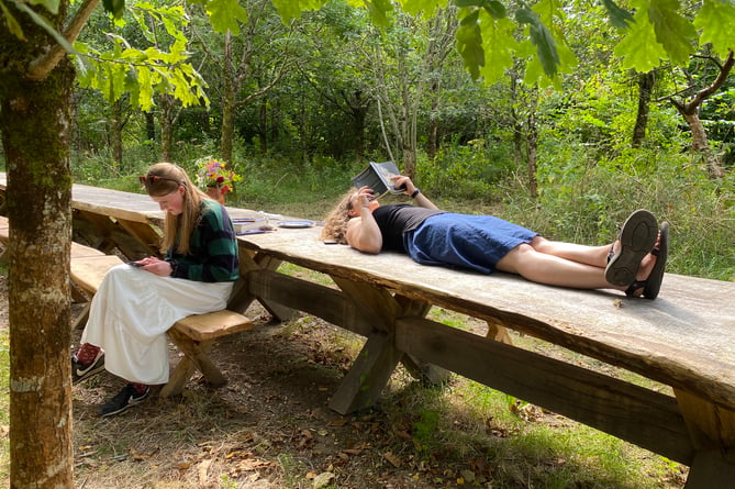 The oak table being enjoyed by people of all ages