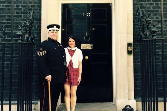 Heidi Mitchell and her late husband Martin outside Number Ten, Downing Street.