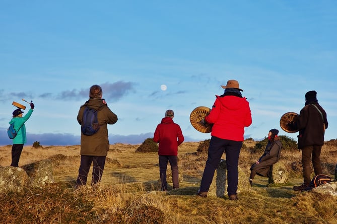 The group gathered at Belstone Cairn circle to see the moon rise