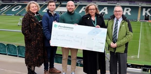 Builder boosts football charity funds