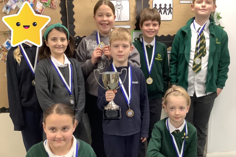 The Meavy Primary swimmers with their cup for winning the small school category of the Tavistock Area Schools Swimming Gala