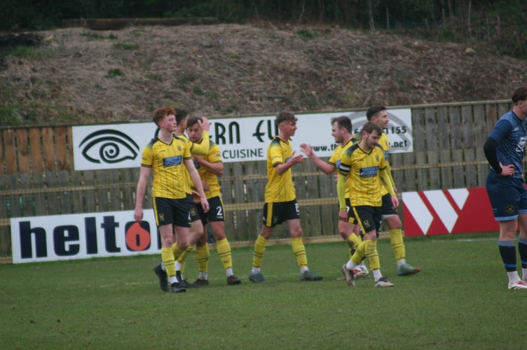 Buckland Athletic celebrate Will Hall's goal