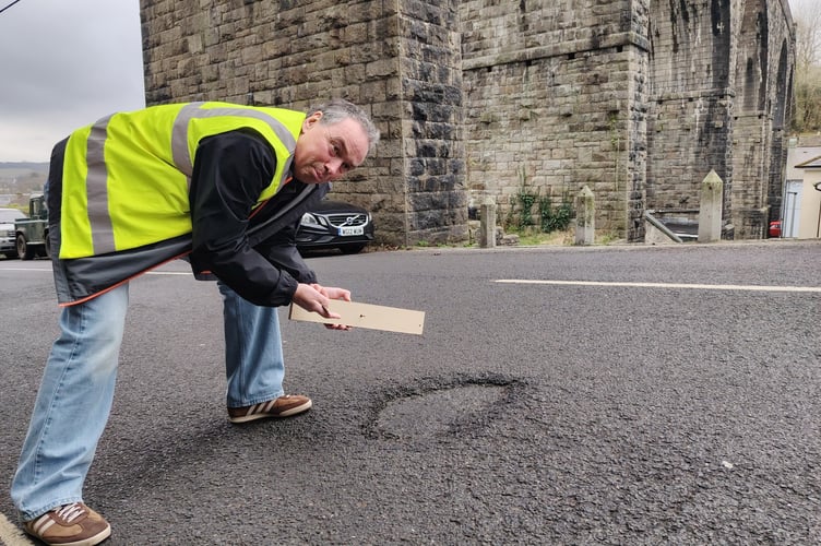 Pothole campaigner Dave Newcombe is highlighting the latest tarmac traps needing mending in Tavistock.