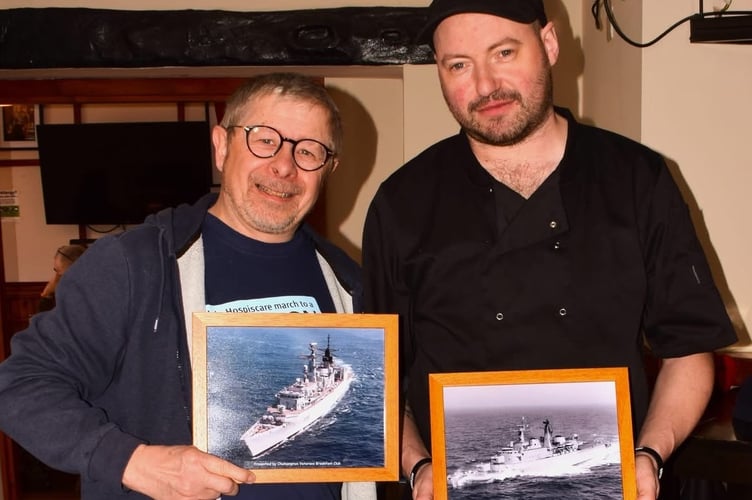 Kevin Ball presenting framed photographs of the frigates 